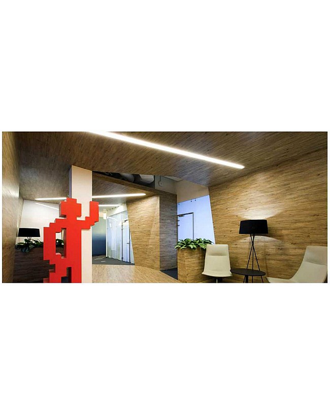 The 125mm wide LED strip channels installed in the ceiling in offices