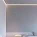 The plasterboard LED channels are installed on ceiling-wall for modern linear lighting