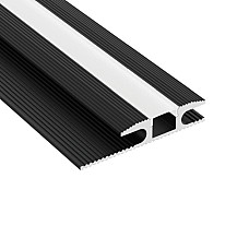 Recessed black LED channels with diffusers for floor carpet joint lighting
