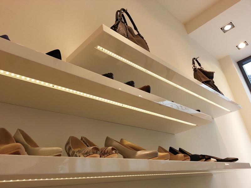 The LED Aluminum profiles are recessed under the shopping shelves as accent lighting