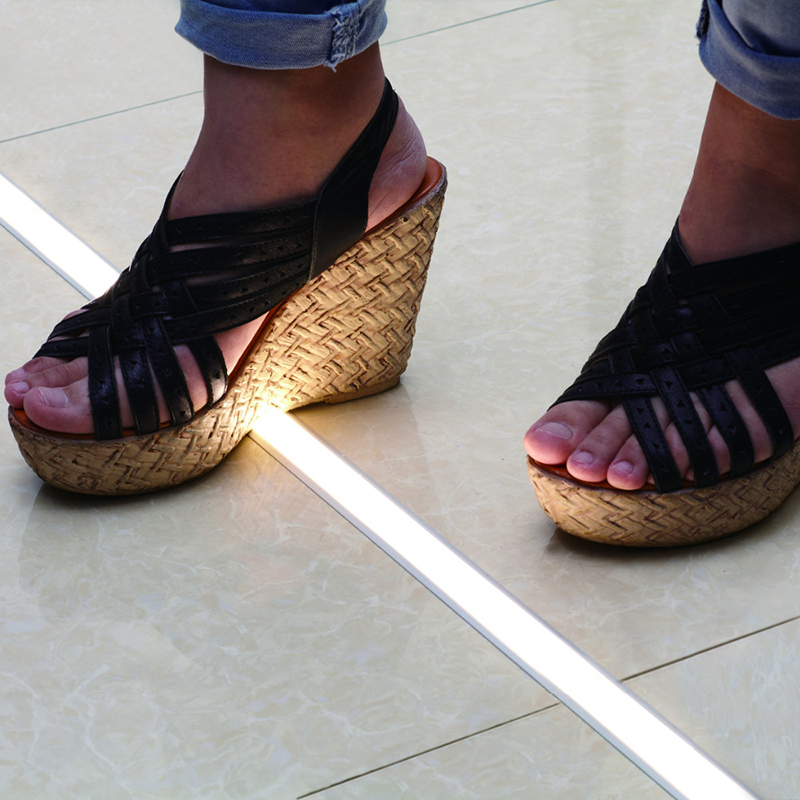 Heavy traffic safe LED channels for embedded lighting